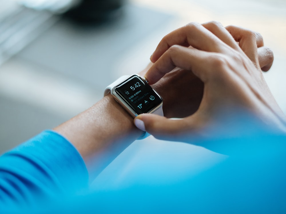 Athlete checking a sports watch